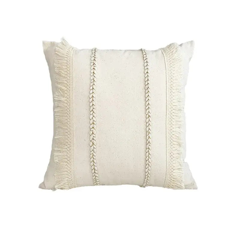 Off-white square cushion cover with lace floral texture, braided cords, and fringed edges for decorbites boho white style