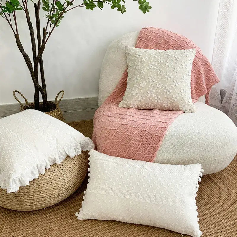 Soft white cushion cover with delicate lace floral embroidery and fluffy pom-pom trim decorbites boho white style