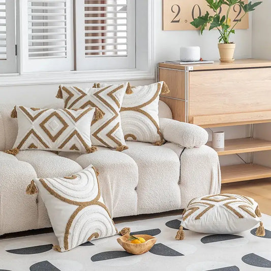 Cream-colored plush cushion cover with tan and white geometric tufted fringe pillow case for living room decor