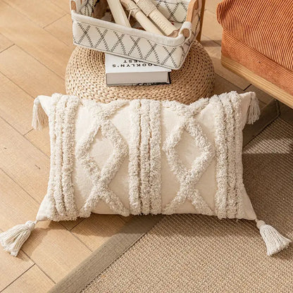 Cream-colored boho cotton pillow cover with textured woven tassels and diamond-patterned fringe decorbites boho cotton tassel decor