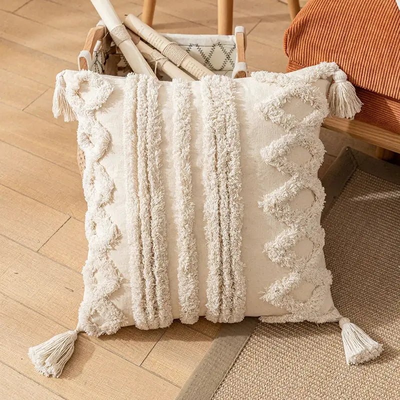 Cream-colored textured cotton pillow cover with fringed vertical stripes and tassels for living room decorbites boho cotton decor