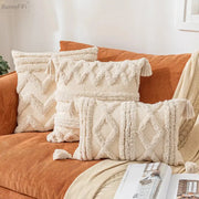 Cream-colored boho cotton tassel pillow cover with textured woven geometric patterns for living room decorbites decor