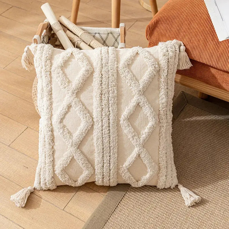 Cream-colored boho cotton tassel pillow cover with diamond-patterned textured trim for living room decorbites decor