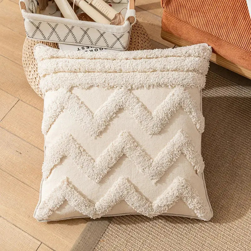 Cream-colored square pillow cover with textured fluffy zigzag pattern in off-white yarn decorbites boho cotton tassel decor