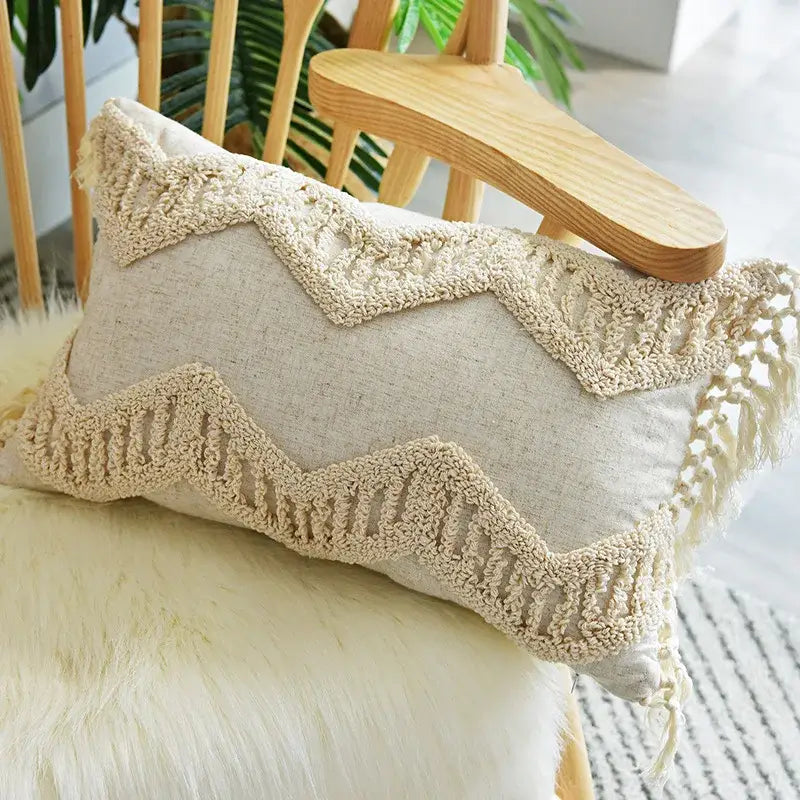 Beige rectangular pillow with textured woven zigzag trim and tassels in boho cream pillow cover set for bedroom