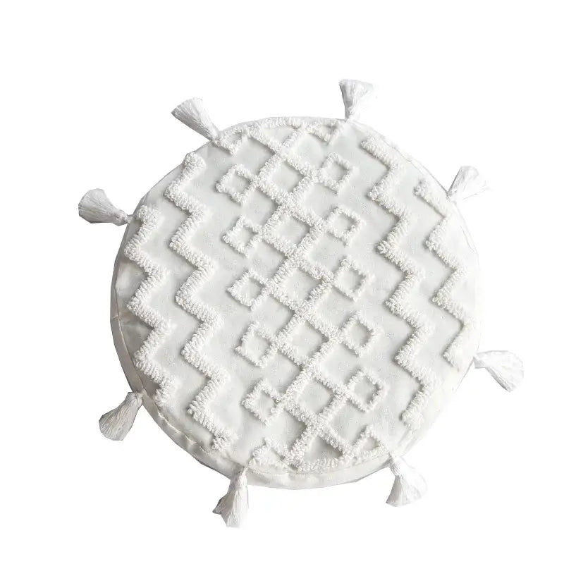 Boho cream textured round lumbar pillow cover set with white zigzag pattern and tassels for bedroom decor