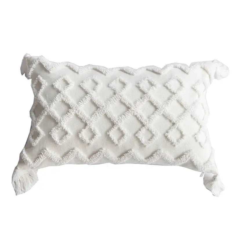 White rectangular boho pillow cover set with textured diamond pattern and cream tassels for bedroom decor