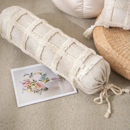 Beige linen bolster pillow cover set with textured grid pattern and frayed edges for boho bedroom decor