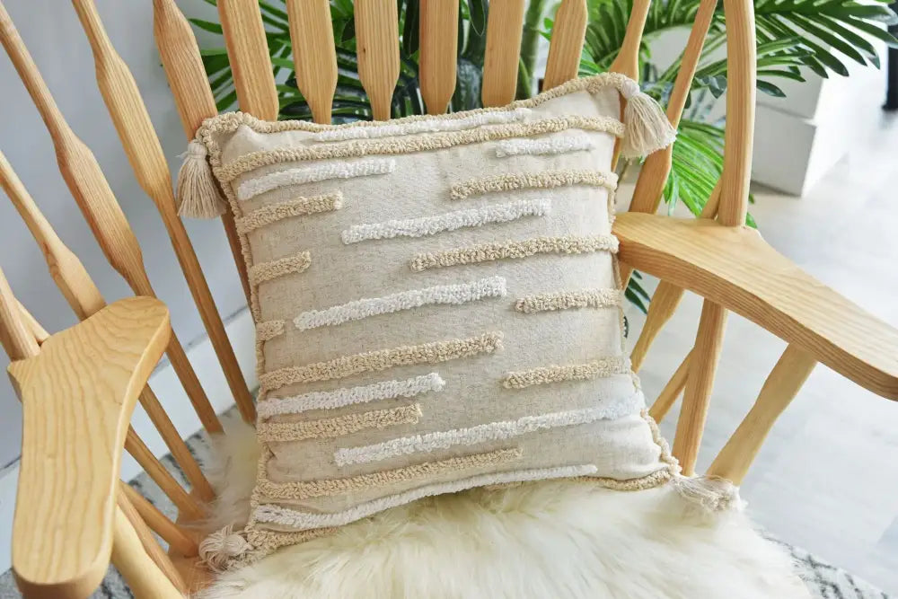 Beige textured throw pillow cover set with cream woven stripes and tassels for boho bedroom decor
