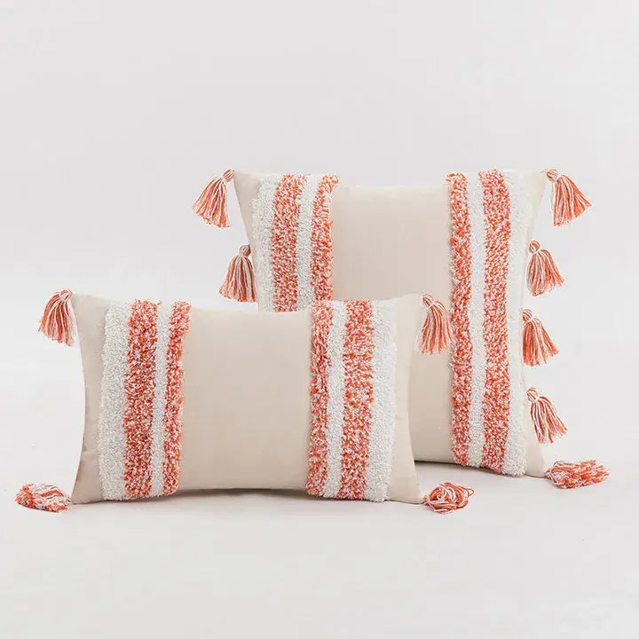 Boho cream tufted cushion cover with coral textured vertical stripes and tassels for living room decor