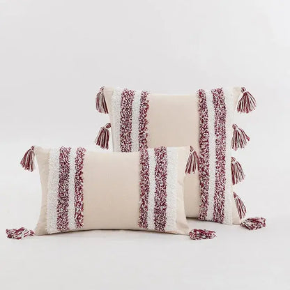Boho cream tufted cushion cover with maroon and white striped texture and tassels for living room decor