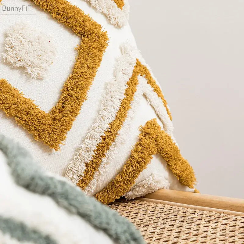 A cozy white and mustard-yellow boho diamond pillow with textured fringed cushion covers for living room decorbites boho diamond