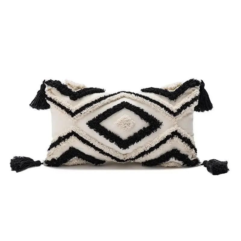 Cream-colored boho diamond pillow with black geometric patterns and tassels for living room cushion covers decorbites