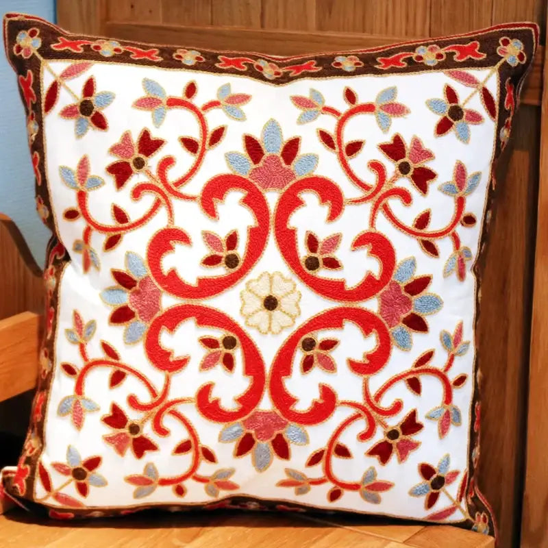 A boho ethnic flower elephant square pillowcase with red blue pink floral embroidery and dark brown border decorbites ethnic flower