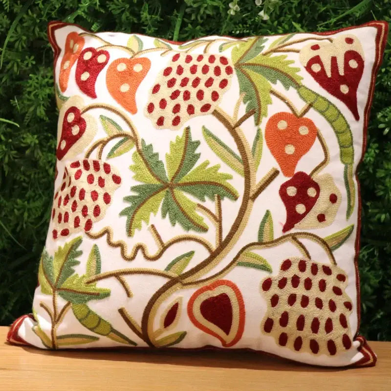 A square embroidered flower elephant pillowcase with vibrant strawberries and vines in reds and greens for ethnic flower decorbites