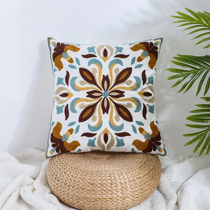 Boho farmhouse floral cream embroidered pillow covers with brown teal and tan floral patterns for living room decorbites decor