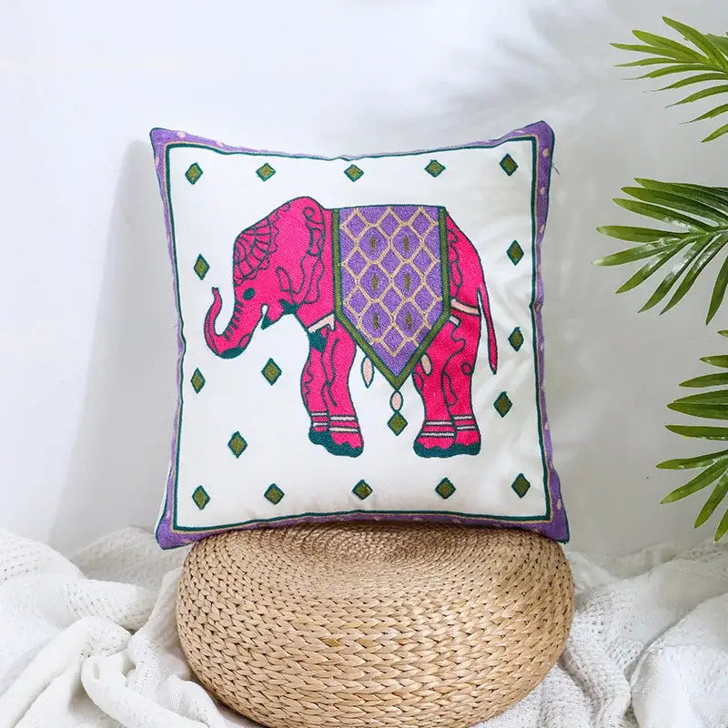 Vibrant pink embroidered elephant pillow cover with purple geometric and green diamond accents for decorbites boho farmhouse floral decor