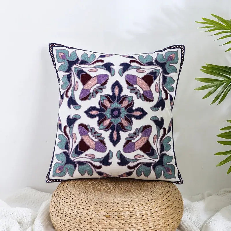 Boho farmhouse floral cream embroidered pillow covers with purple teal and pink floral patterns for living room decorbites