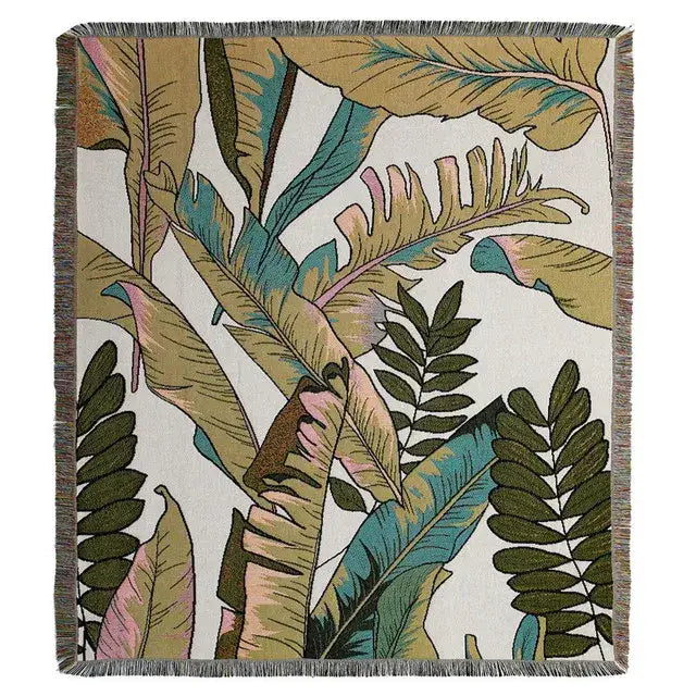 Boho floral cotton woven throw blanket with tropical leaf pattern in green gold and teal on cream for decorbites boho floral decor