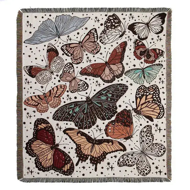 A cozy cream woven floral cotton blanket with boho floral decorbites butterflies on a starry background for living room throw