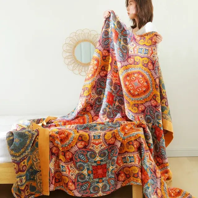 Boho floral cotton gauze leisure blanket with vibrant orange paisley pattern and intricate blue yellow circular designs