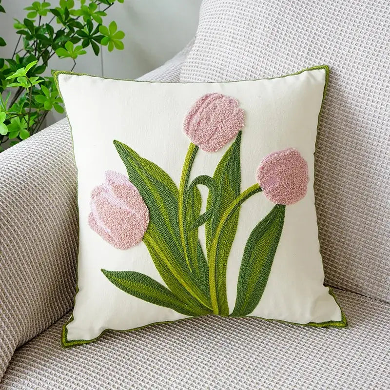 Cream-colored cushion cover with boho floral embroidered pink tulips and olive-green border for living room decorbites boho floral