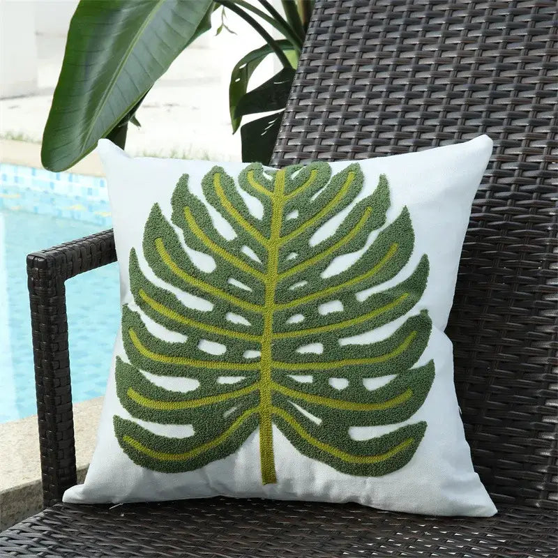 White cushion cover with textured boho floral embroidered green and yellow monstera leaf for living room decorbites
