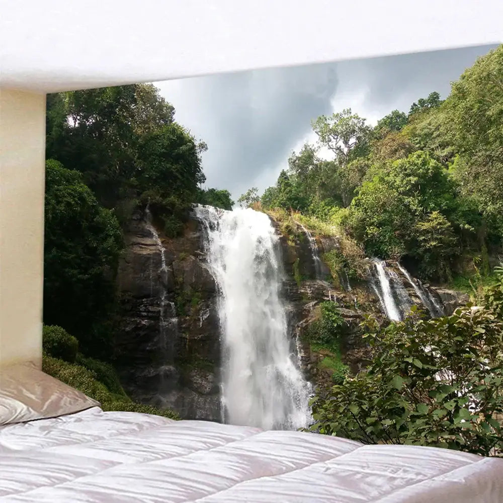 Boho forest waterfall art tapestry with lush green forest waterfall decorbites design hanging above bed