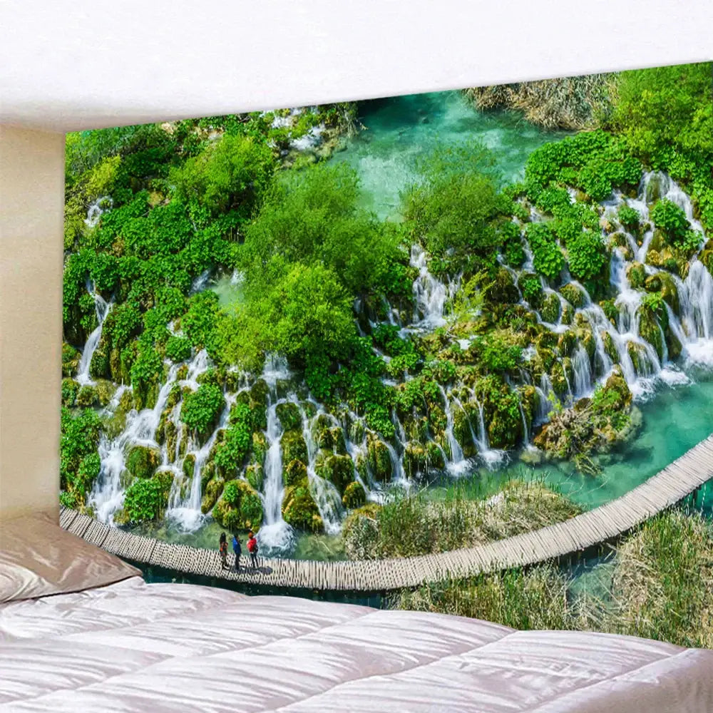Boho forest waterfall art tapestry featuring vibrant turquoise waterfalls over mossy rocks with rustic wooden bridge decorbites forest waterfall