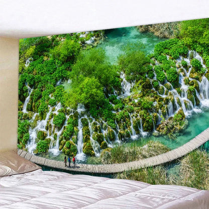 Boho forest waterfall art tapestry featuring vibrant turquoise waterfalls over mossy rocks with rustic wooden bridge decorbites forest waterfall