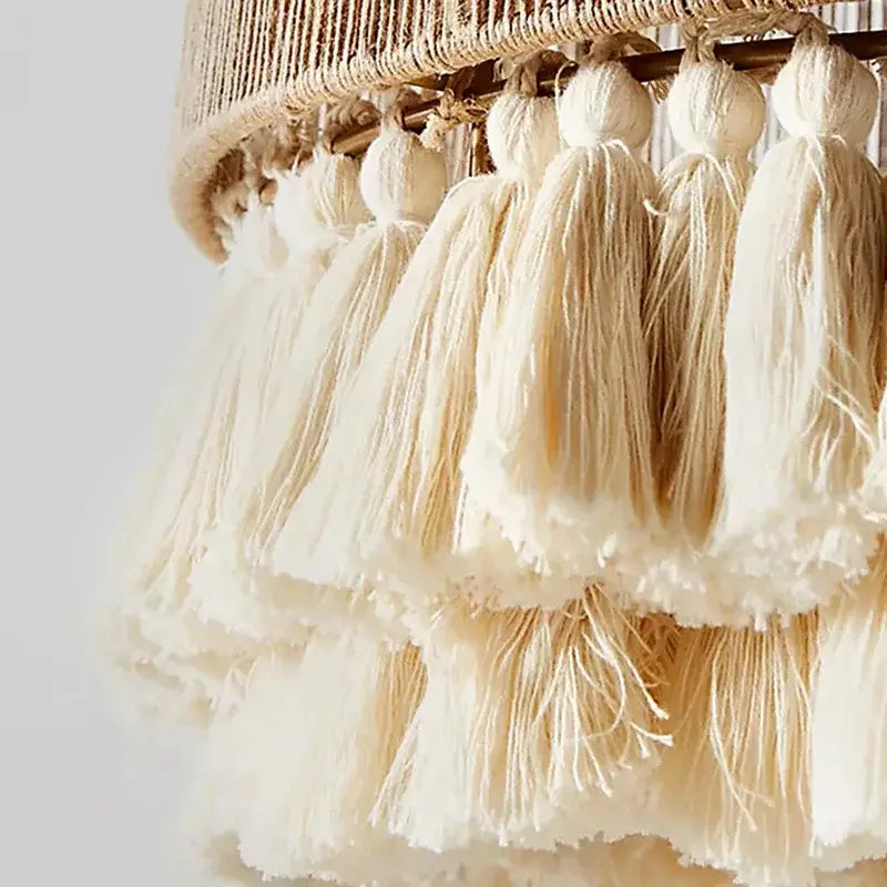 Beige macrame pendant light with layered fluffy fringe and woven top boho fringe hemp rope decorbites boho fringe