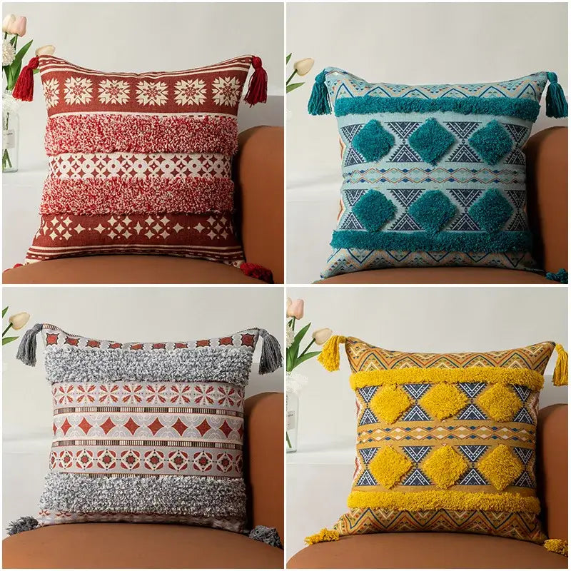Four boho fringe pillow covers with intricate woven patterns and tassels in yellow and multicolored earthy tones by decorbites