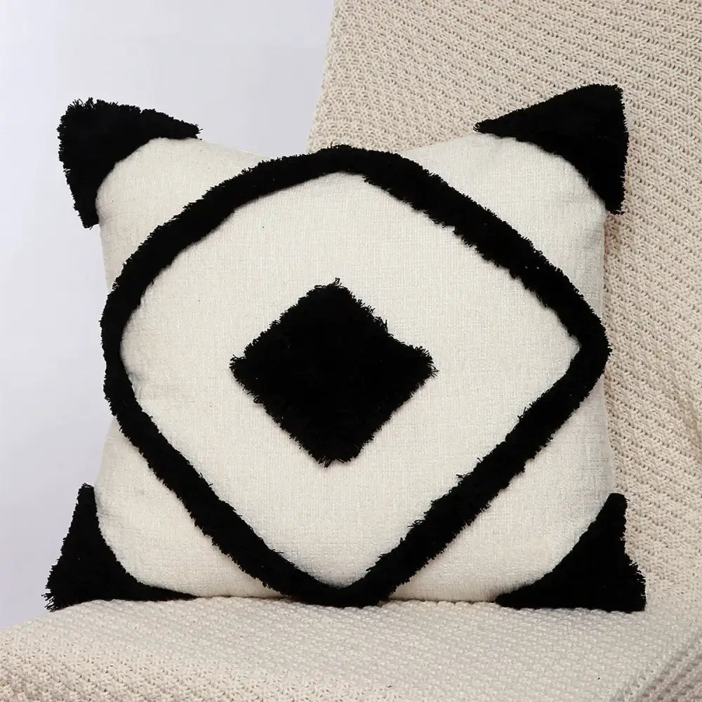 Black and cream geometric chenille embroidered pillow covers with fringed accents for boho living room decorbites decor
