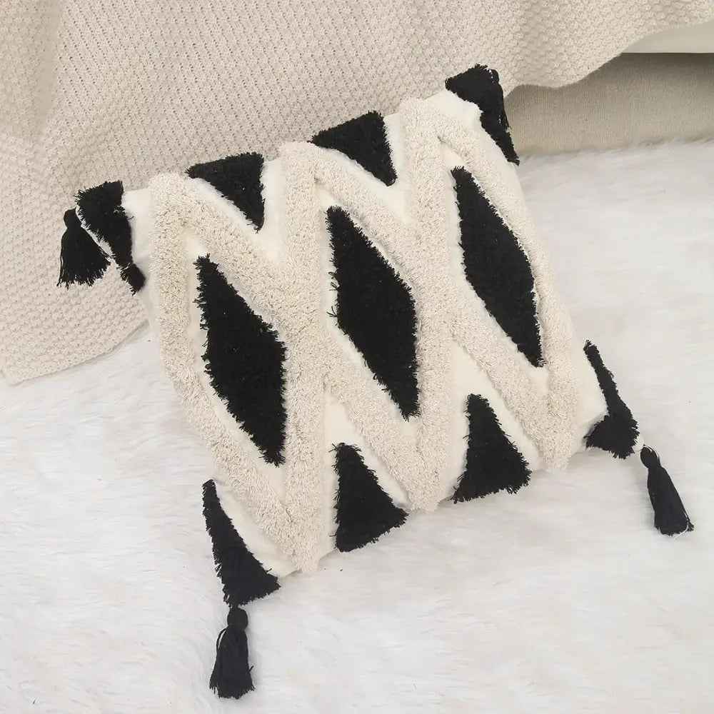Black and cream-colored boho geometric chenille embroidered pillow cover with tassels for living room decorbites set
