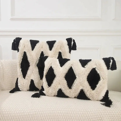 Black and cream pillow covers with boho geometric chenille embroidered diamond patterns and tassels for living room decorbites
