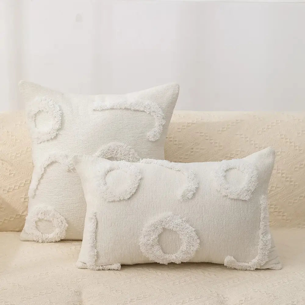 Cream-colored rectangular pillow cover with textured fringed circular appliqués boho geometric chenille embroidered decorbites