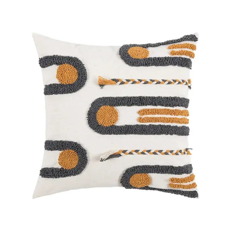White cotton cushion cover with boho geometric embroidered abstract patterns in dark gray and mustard yellow for living room decor
