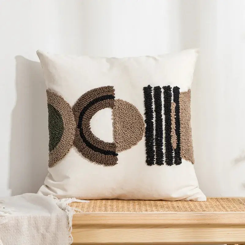 Cream-colored cushion cover with decorbites geometric embroidery in earthy tones for boho living room decorbites geometric embroidery pillow
