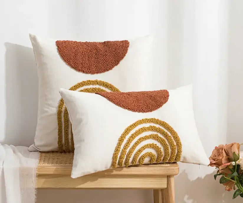 White throw pillows with textured earth toned woven rainbow and half circle designs boho loop tufte cushion cover decorbites boho loop
