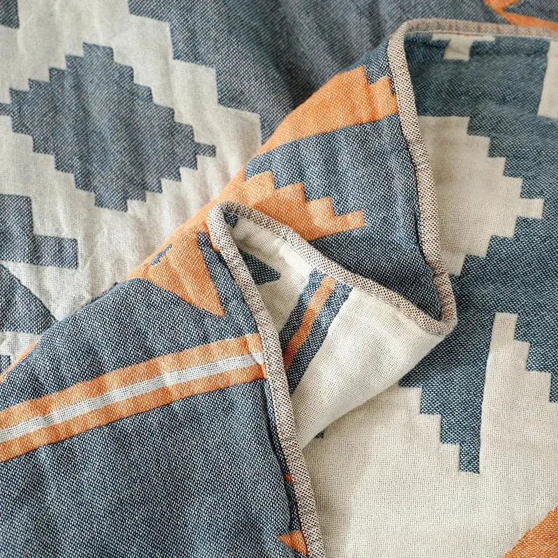 Boho cotton sofa throw blanket decorbites soft textured geometric pattern in blue orange and cream with woven border