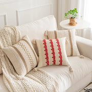 Cream-colored decorbites boho geometric tassel cushion cover with red and beige embroidered patterns for living room decor