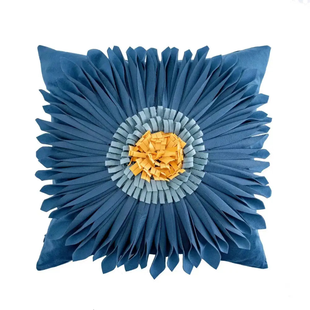 Blue floral cushion with layered petal design and yellow orange center in decorbites boho geometric tufted cushion cover