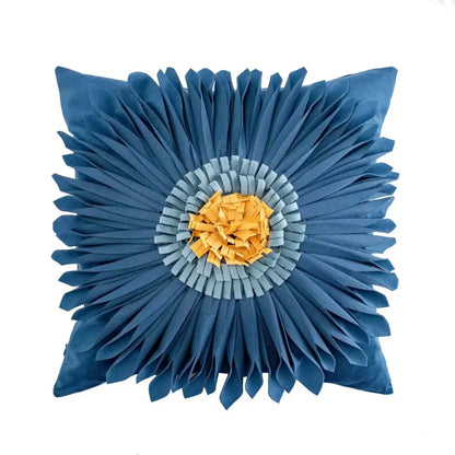 Blue floral cushion with layered petal design and yellow orange center in decorbites boho geometric tufted cushion cover