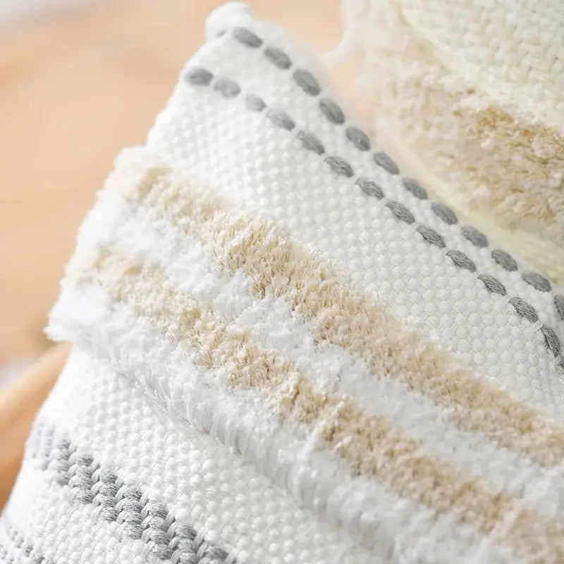 Textured white and beige woven boho geometric tufted cushion cover with gray dotted accents for living room decorbites