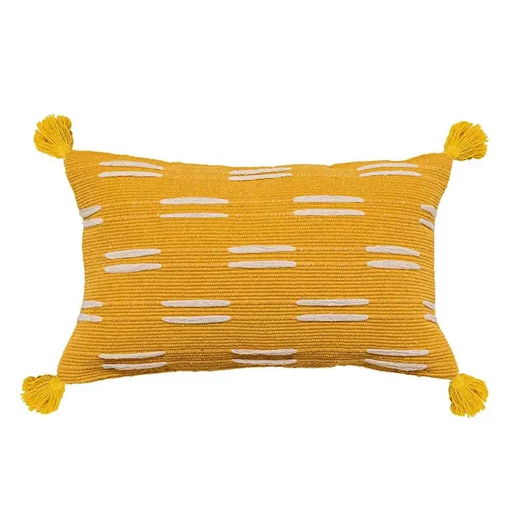 Vibrant yellow cushion cover with white embroidered stripes and tassels by decorbites boho geometric tufted design
