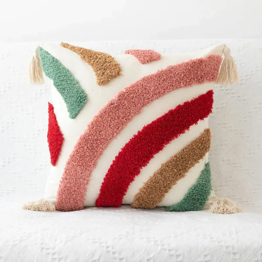 Cozy white cushion cover with colorful boho geometric tufted stripes and tassels by decorbites for living room decor