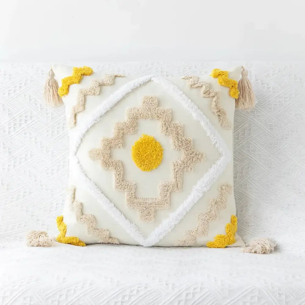 Cream-colored decorbites boho geometric tufted cushion cover with beige and mustard yarns and tassels for living room decor