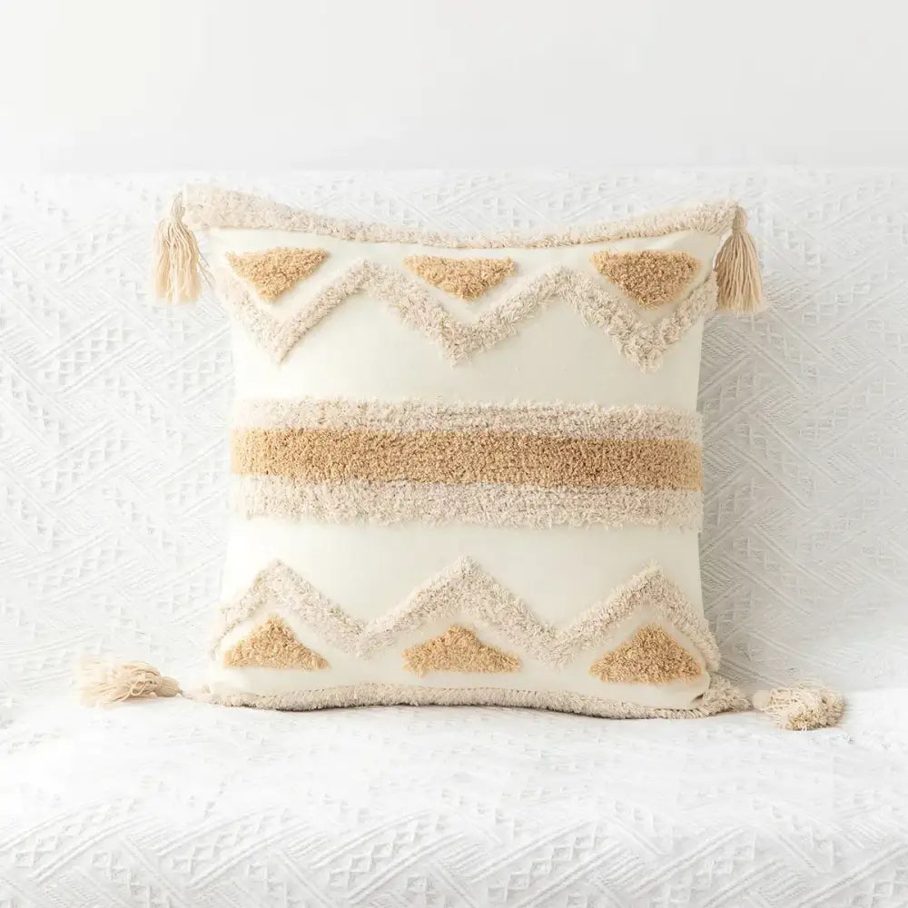 Cream-colored boho geometric tufted cushion cover with textured beige patterns and tassels for living room decorbites decor