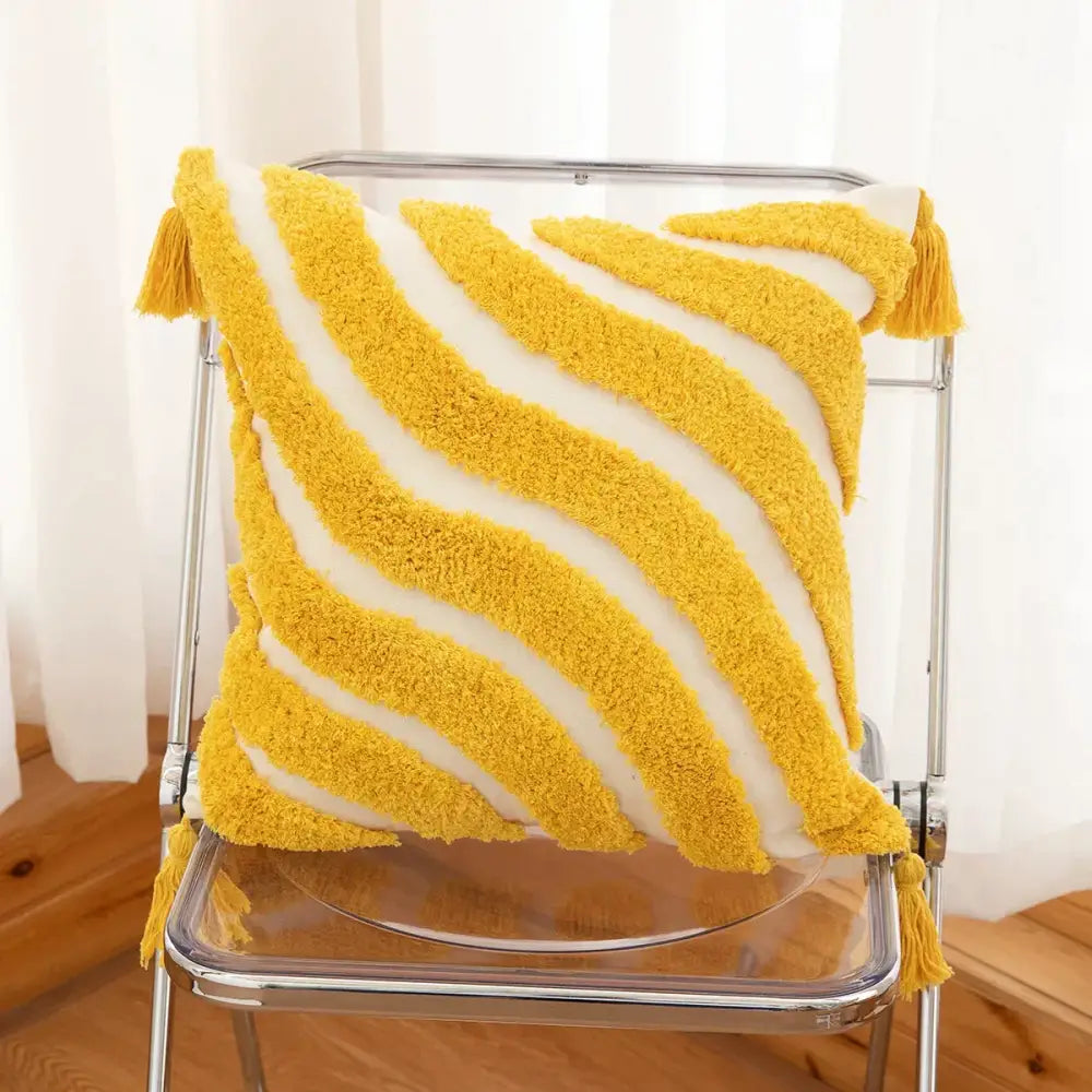 Cozy mustard-yellow and white striped boho geometric tufted cushion cover with fluffy tassels by decorbites for living room decor