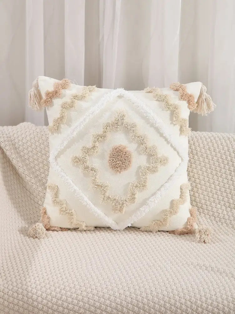 Cream-colored cushion cover with beige decorbites geometric tufted embroidery and tassels for living room decor